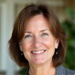 Headshot of Sarah, 42, smiling confidently, representing her transformation from stress to calm.