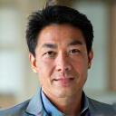 Portrait of Dr. Aaron Kim, a calm and wise-looking mental health professional.