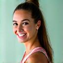 Portrait of Sarah Jenkins, a vibrant and energetic fitness trainer.